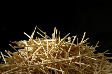 A toothpick is a small thin stick of wood