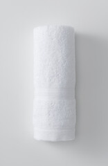 A towel placed on a white background. View from above
