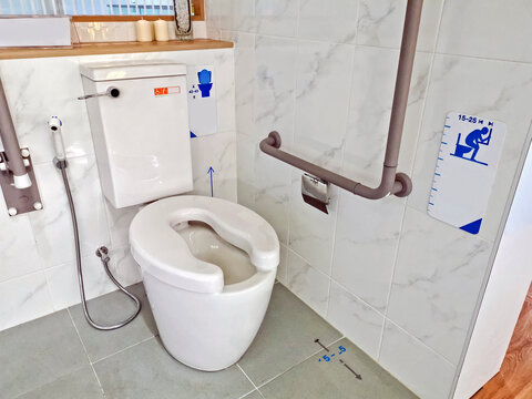 Bathroom for the disabled or elderly people. Handrail for disabled and elderly people in the bathroom.