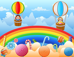 Happy kids flying over a candy land