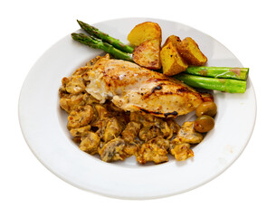 Fototapeta premium Healthy dinner of baked chicken breast fillet with mushrooms and vegetable garnish. Isolated over white background
