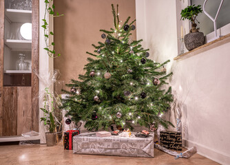 Merry Christmas beautiful living room tree setup gifts package decorated for Happy Holidays at home