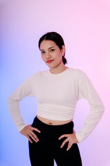 Young asian woman in white long sleeves on pastel background.