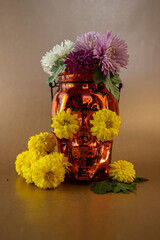 halloween still life skull with flowers in eyes