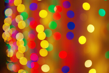 Festive background. Defocused images of colored circles.
