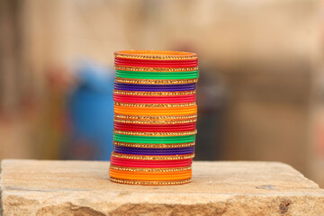 multi color bangle put on a stone