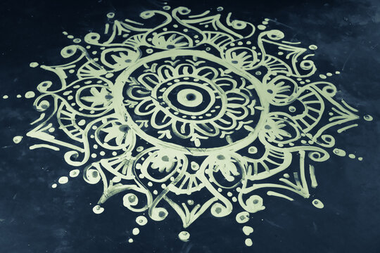 Decorative Floral Patterns or Bengali Folk Design known as Alpana at home at Lakshmi puja or Lokkhi puja