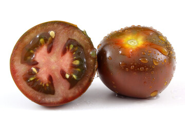 Brown tomato with a half