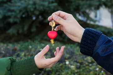 bunch of keys with a heart shaped trinket