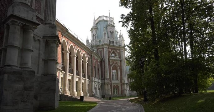 4K high quality sunny spring day video footage of famous Moscow Tsaritsyno Estate built during rein of Czarina Katherine 2 The Great with visitors and panorama of green park in the capital of Russia