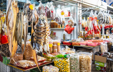 The seafood shop is covered with dried salted fish and seafood