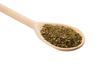 Oregano spice in wooden spoon isolated.