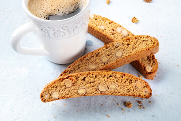 Italian breakfast. A close-up of cantucci, almond cookies, with a cup of coffee