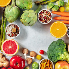 Healthy vegan food square banner with fruit, vegetables, legumes, mushrooms etc, shot from above with copy space. Food variety concept