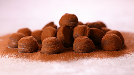 heap of chocolate truffes and cocoa