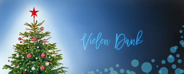 Fototapeta na wymiar German Text Vielen Dank Means Thank You. Christmas Tree With Christmas Ball Decoration And Ornamen Like Star. Blue Background WIth Bokeh Effect.