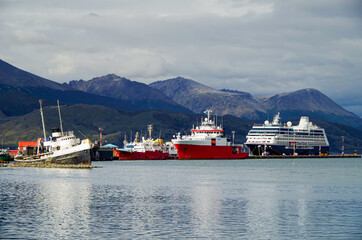 Modern cruise ship, cruiseship liner or expedition vessel ship in port of Ushuaia, Argentina with...