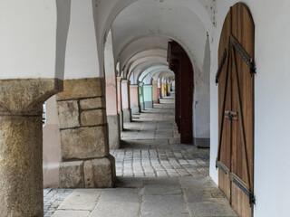 arcades on a czech historical square