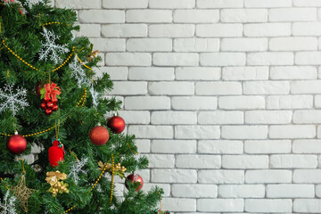 Fototapeta na wymiar christmas tree white background brick texture.