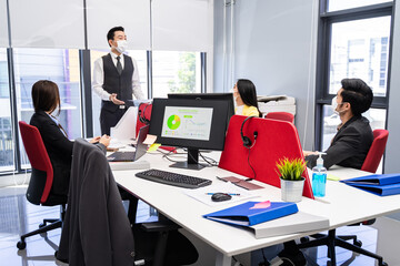Group of Asian business people working in office, New normal lifestyle