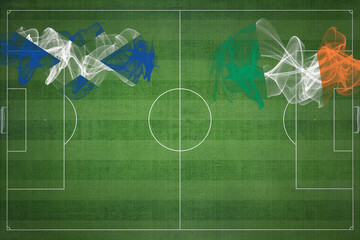 Scotland vs Ireland Soccer Match, national colors, national flags, soccer field, football game, Copy space © allexxandarx
