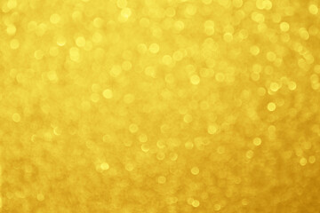 Abstract blur gold glitter sparkle defocused bokeh light background