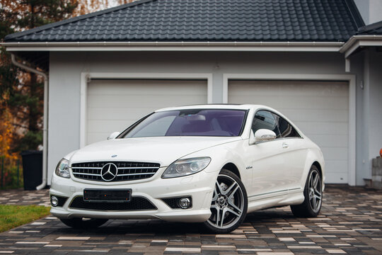 Mercedes Benz CL63 AMG near a private house 
