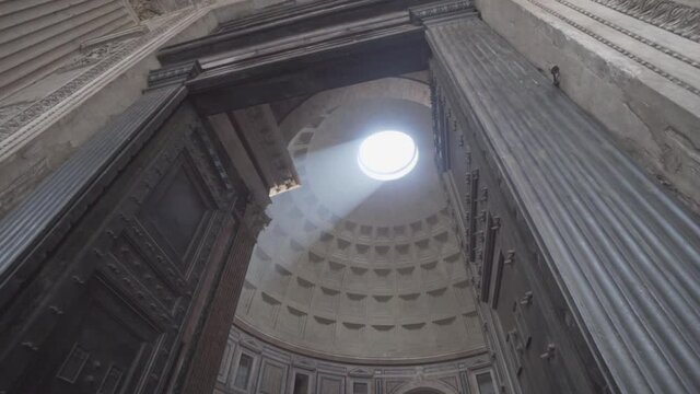 Rome, Italy - Pantheon Pantheum Temple of all the Gods - Renaissance Ancient Architecture Building - Interior Beam Light