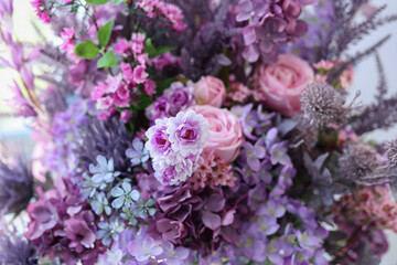 Closeup image of beautiful flowers wall background with amazing colorful roses. Top view