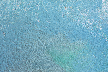 Blue background with oil paint. Beautiful close - up brushstrokes. Textured abstract background. Oil painting on cardboard and canvas. Winter and Christmas concept. Layout for greetings.