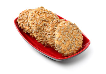 closeup large biscuits with sunflower seeds on white background