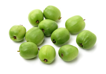 mini kiwi baby fruit (actinidia arguta) on white background 