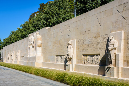 General view of the Reformation Wall in the Parc des Bastions in Geneva, Switzerland, with the statues to John Calvin and the Calvinism's main proponents, on a sunny day.