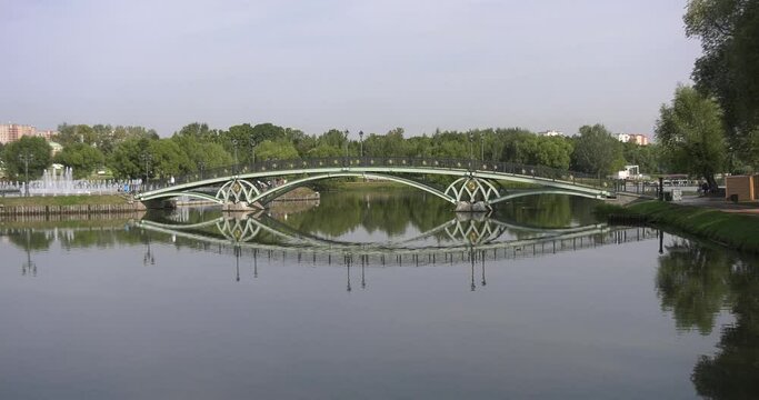 4K high quality sunny spring day video footage of famous Moscow Tsaritsyno Estate built during rein of Czarina Katherine 2 The Great with visitors and panorama of green park in the capital of Russia