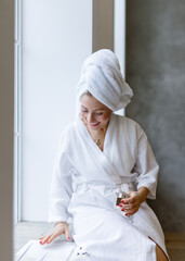 portrait of a woman in a white coat