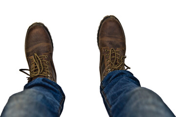 isolate of male feet in boots and jeans