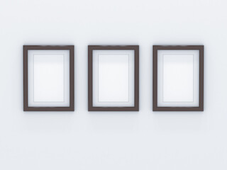 Empty photo frames hanging on the wall. 3d rendering illustration