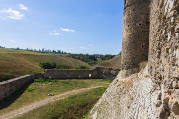 Fototapeta na wymiar Protective stone wall of a medieval fortress