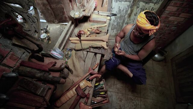 traditional manufacturing of keris handle at Terengganu malaysia with close up shot