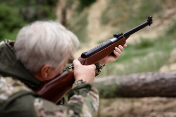 Grandpa Hunting Man Aiming Target with Shotgun.