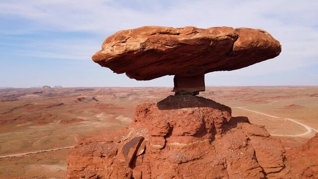 Aerial shot of the amazing balancing rock formation of Mexican Hat in Southern Utah