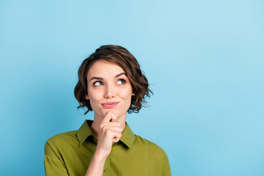 Photo portrait of nice girl having new idea trying to find solution dreaming looking up having a plan isolated on blue color background with copyspace