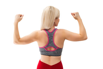 Athletic young woman pumping up her muscles on a white background