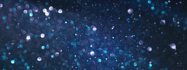 Obraz premium background of abstract glitter lights. silver, blue and black. de focused