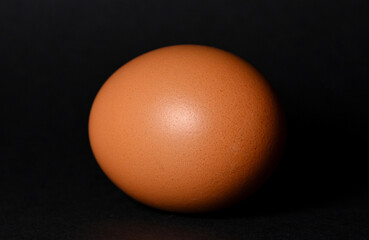 Food Art, egg on a black background