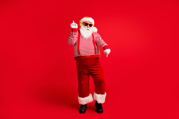 Full length body size view of his he handsome bearded fat overweight cool childish Santa father listening sound dancing having fun rest chill isolated bright vivid shine vibrant red color background