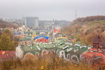 Fototapeta na wymiar Top view of the Kyiv (Kiev) from the Landscape Alley (Peizazhna alley) park, Ukraine, Podil district. Scenic cityscape