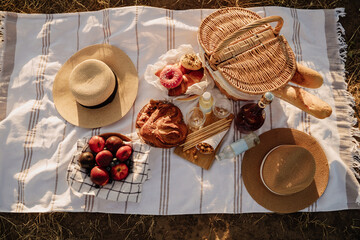 Romantic Picnic Food And Drink on Blanket Top View
