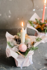 Candles with a New Year tree on a beautiful background. New Year. New Year's toys, Christmas