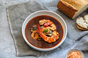 Bouillabaiss, French fish soup with sea bass and prawns